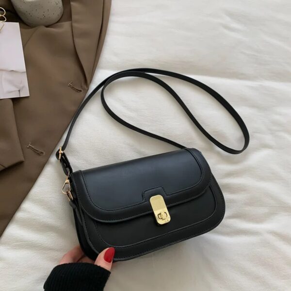 CARTERA MODELO BANDOLERO EN CUERO PU NEGRA