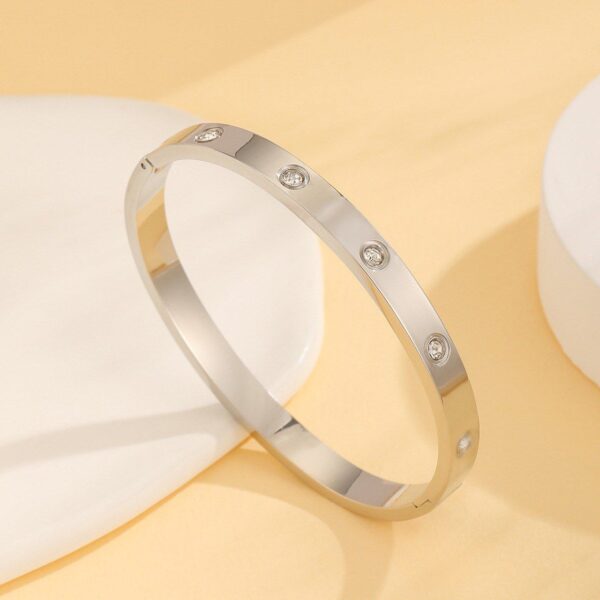 BRAZALETE CARTIER RIGIDO PLATEADO ACERO 316L