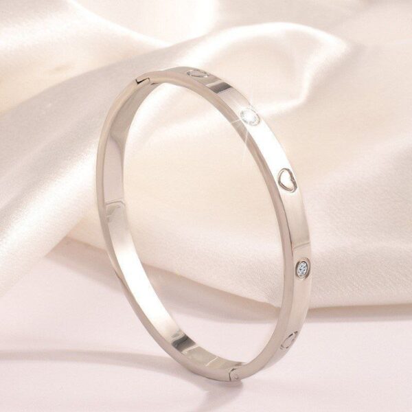 BRAZALETE CARTIER CORAZONES ACERO 316L